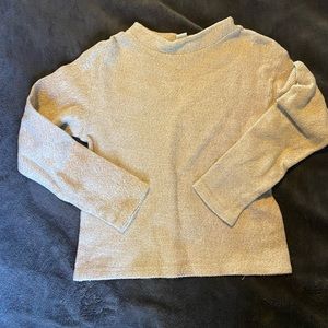 H&M sweater in the size XS definitely fits true to size